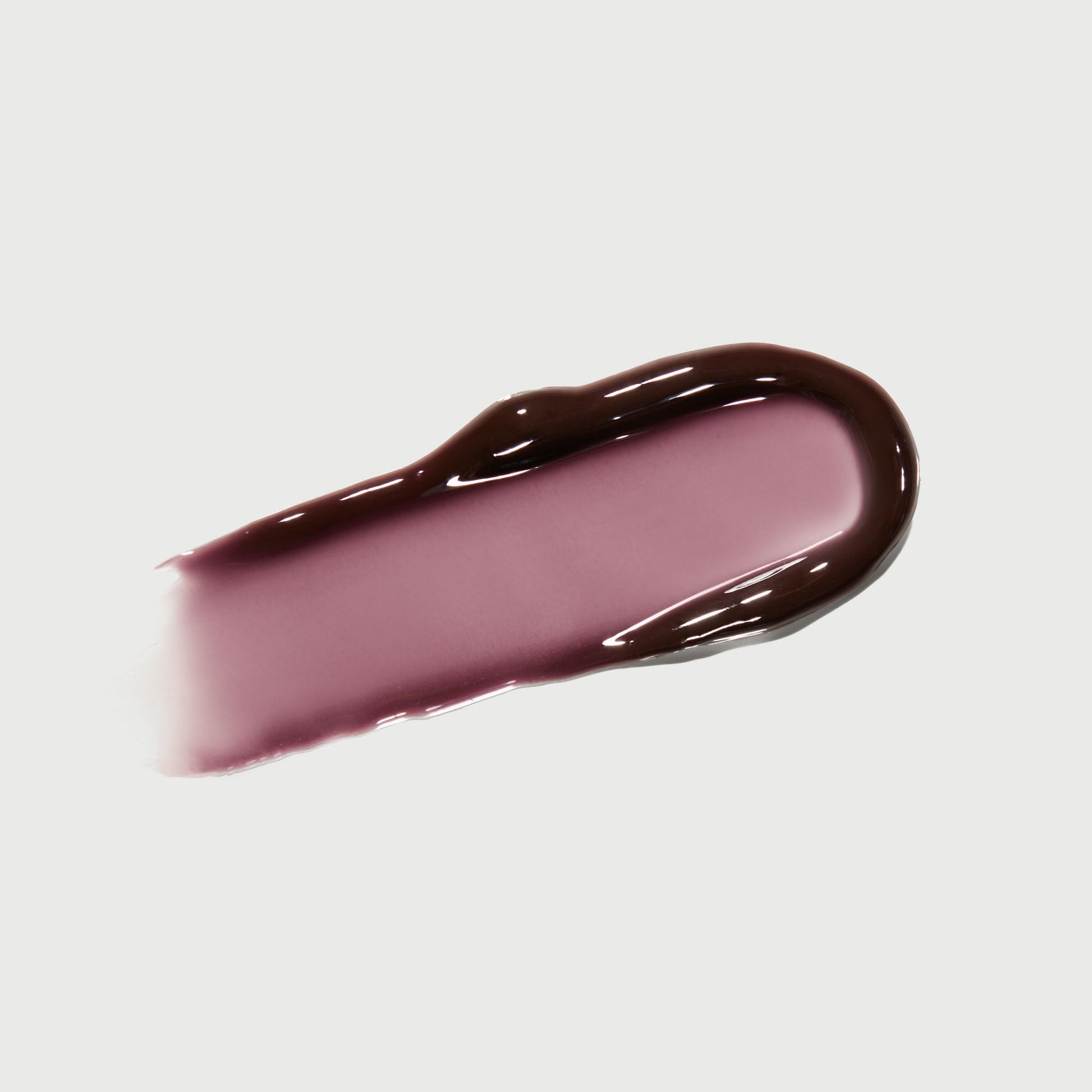 phyto-glow-lip-balm-midnight-y8 NATR-10118-Swatch-Phyto-Glow-Midnight-bonebkgd.jpg