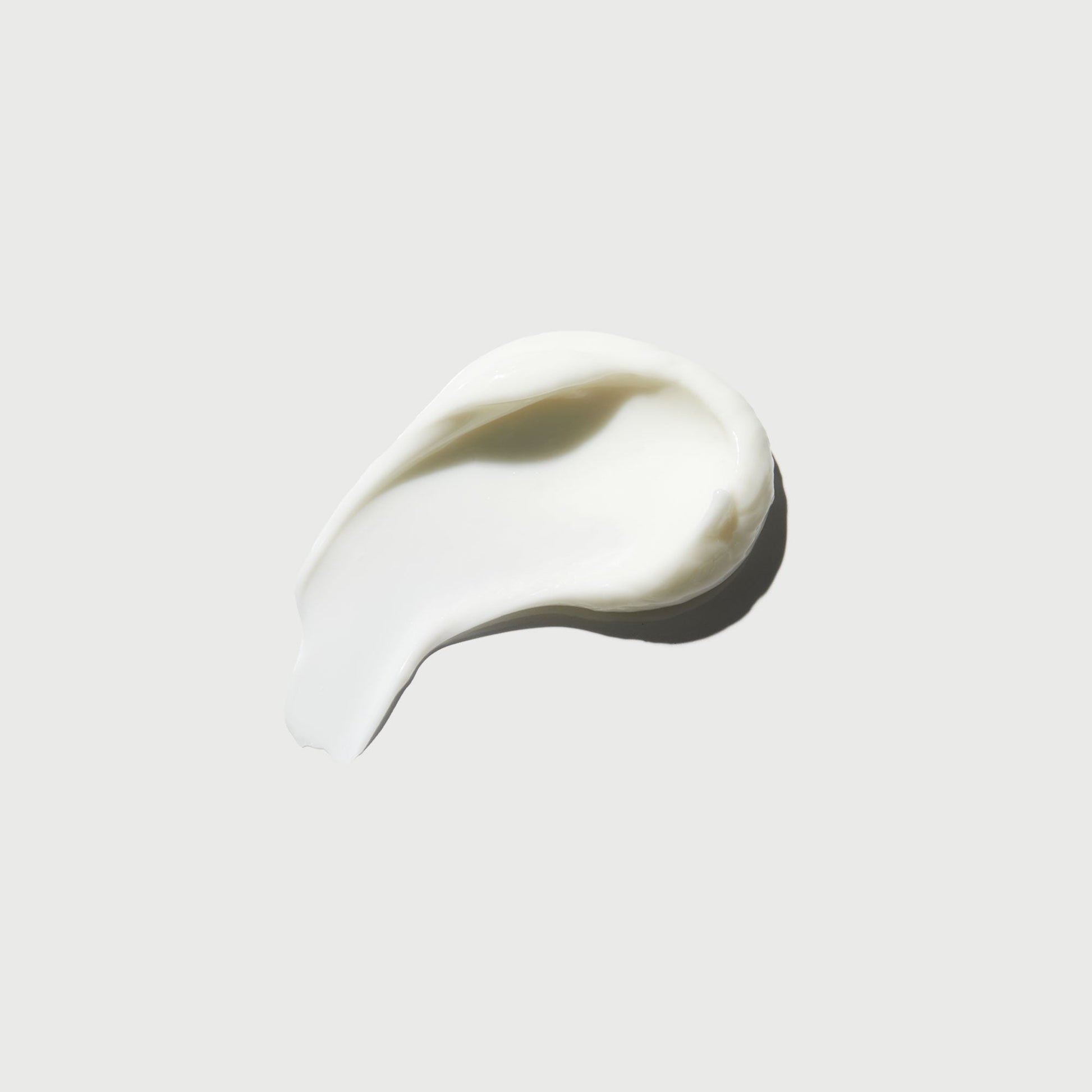 the-smoother-glycolic-acid-body-lotion-l6 NATR-40014-Swatch-The-Smoother-Glycolic-Acid-Body-Lotion-bonebkgd.jpg