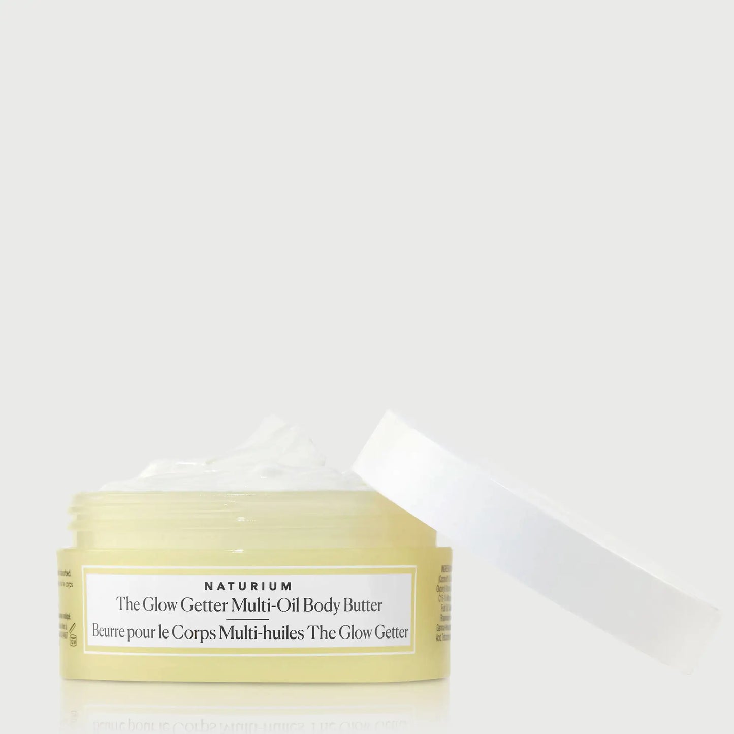 the-glow-getter-multi-oil-body-butter-travel-size-a7 NATR-40115_Glow-Getter-Body-Butter-Mini_front_capoff_bonebkgd.webp