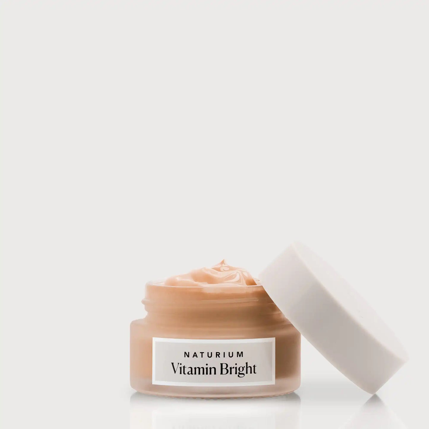 vitamin-bright-illuminating-eye-cream-a9 NATR-VitaminBright_DEEP_Primary_front_openjar_bone.webp